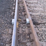 Application of two Tiefenbach wheel detectors to report alternate routing, used to monitor/reports movements at a switch.